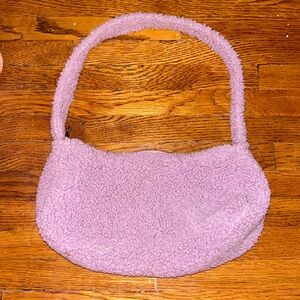 Purple fluffy pull and bear handbag